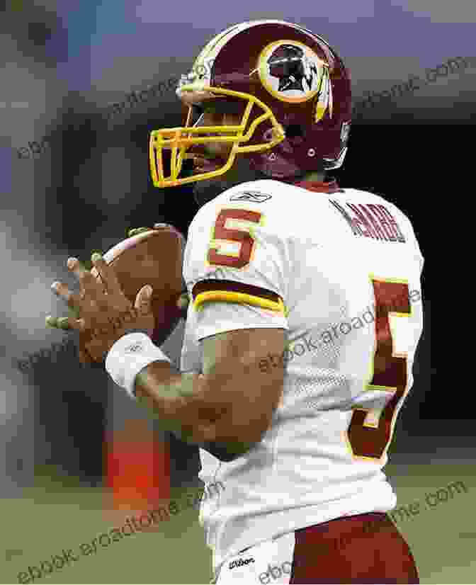 A Black And White Photo Of A Football Player In A Washington Redskins Uniform. He Is Wearing A Helmet And Has A Determined Look On His Face. Can You Identify These Former Washington Football: American Football Quiz Trivia Game: The Washington Football Team Facts