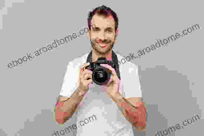 A Man Holding A Camera And Smiling Six Ways To Sell Photos