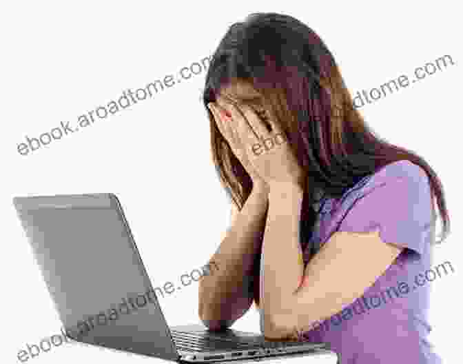 A Young Girl Crying In Front Of A Computer Screen That Reads 'You're A Loser.' Cyberbullying And Harassment