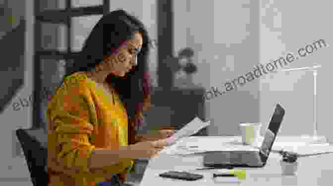 Image Of A Businesswoman Reviewing Financial Documents Someday Is TODAY : Get Your Ideas Out Of Your Coffee Cup And On The Market