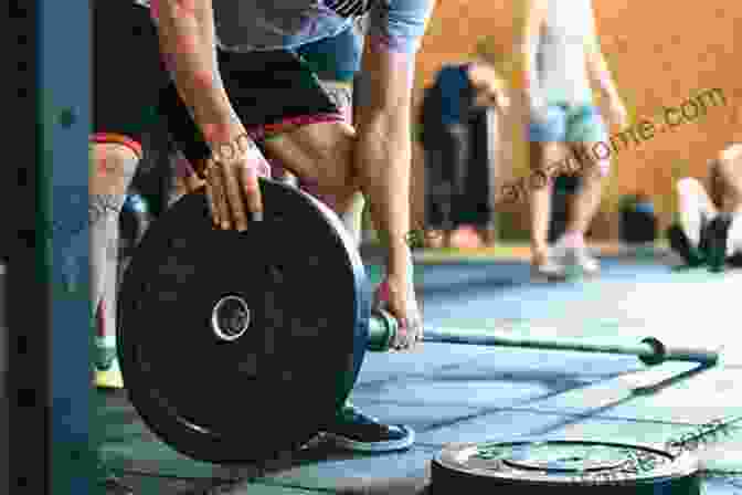 Image Of A Strength Athlete Lifting Weights In A Gym, With A Focus On Their Muscular Physique And Determined Expression Nutrition And The Strength Athlete (Nutrition In Exercise Sport)