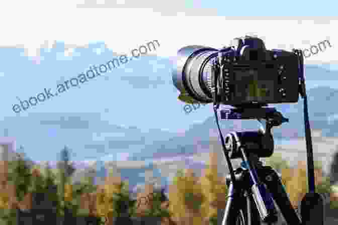 Photographer Using A Tripod And Camera To Capture A Landscape The Photographer S Handbook: Equipment Technique Style